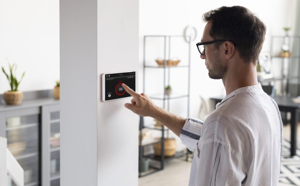 man-using-tablet-his-smart-home